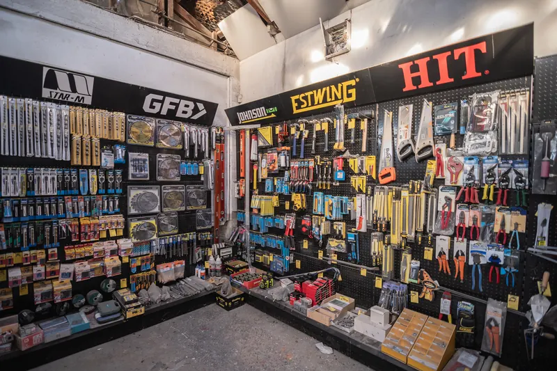The hardware wall at BuildLink Timaru, hung with fixings, fastenings and hand tools
