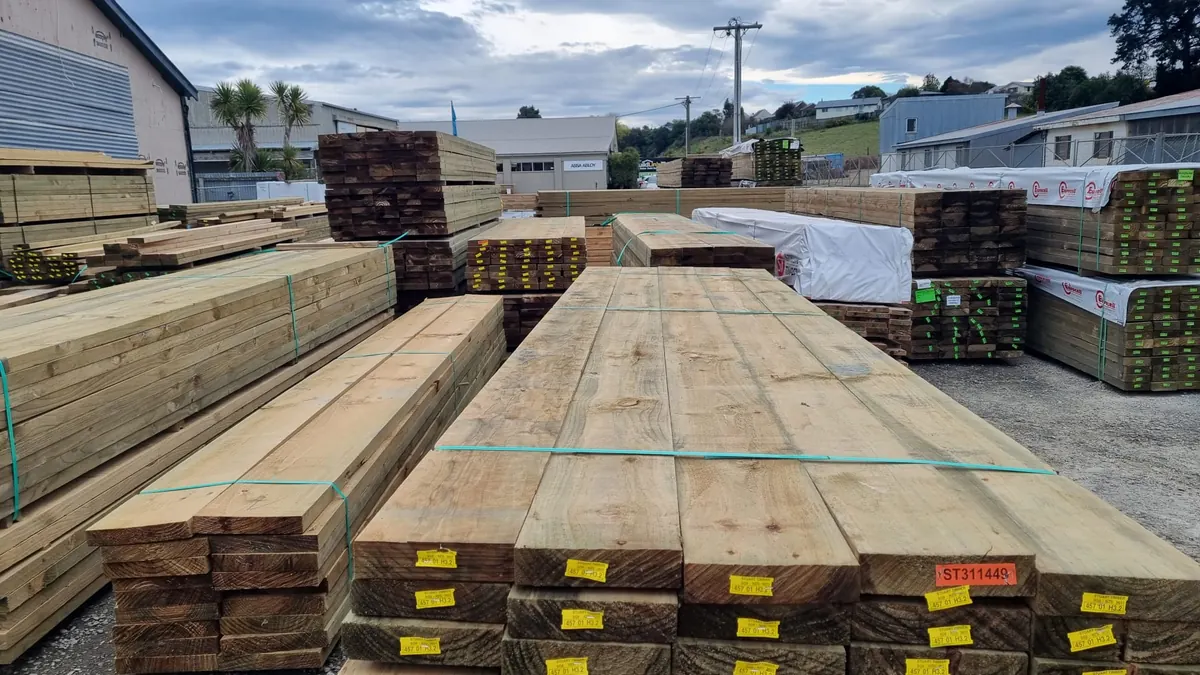 Strapped packs of treated timber stacked in the BuildLink Timaru yard